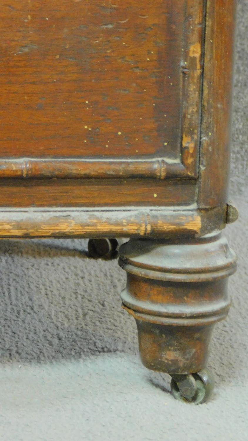 An early 19th century pitch pine chest of drawers with faux bamboo mouldings raised on squat - Image 6 of 6