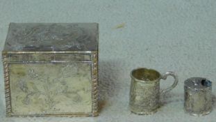 A white metal plated trinket box with Art Nouveau style floral design with rope twist design