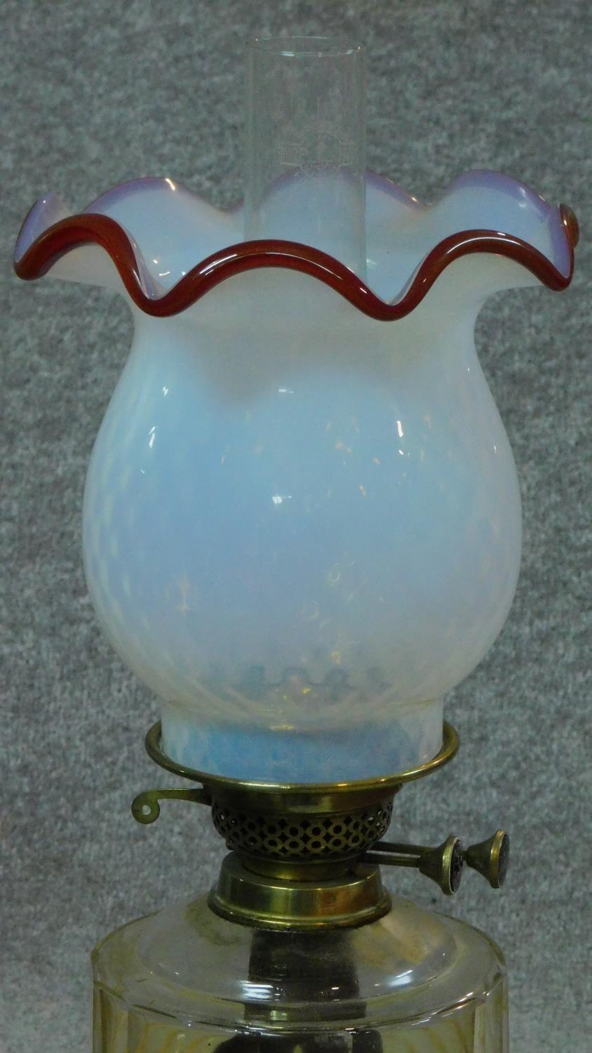 A Victorian opaline white milk glass oil lamp on brass base. (complete) H.55cm - Image 2 of 6