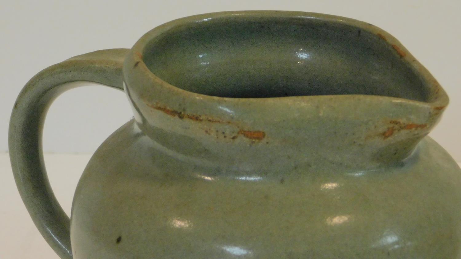 Three glazed studio pottery pieces. Including a glazed jug with pale green glaze and makers mark - Image 6 of 10