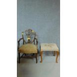 A 19th century mahogany Hepplewhite style armchair and a tapestry upholstered footstool. H.96cm