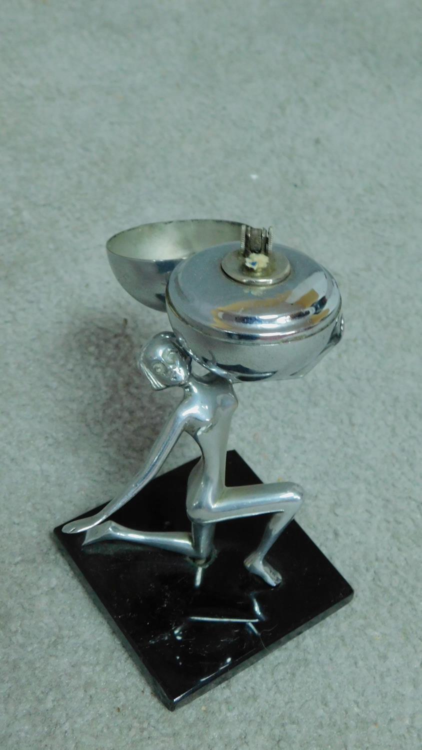 A mid century vintage chromium table lighter in the form of a female rhythmic gymnast and ball. H. - Image 3 of 5