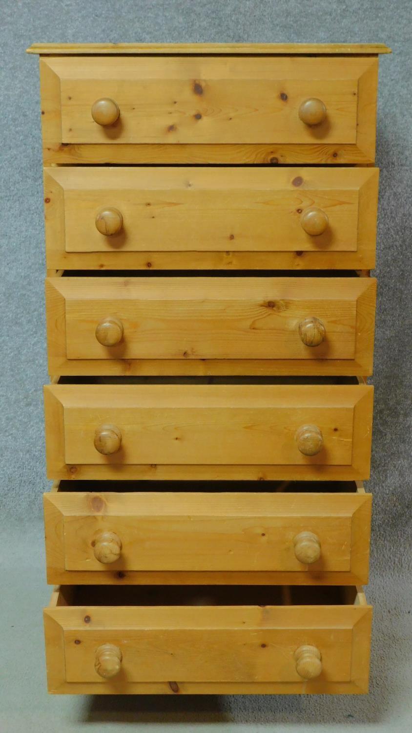 A Victorian style pine tall chest of six drawers on shaped bracket feet. H.123 W.63 D.45cm - Image 3 of 5
