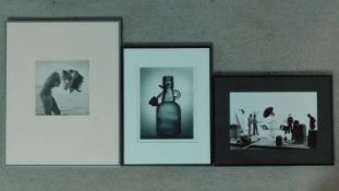 A framed and glazed black and white photograph, nude bathing study and two other framed and glazed