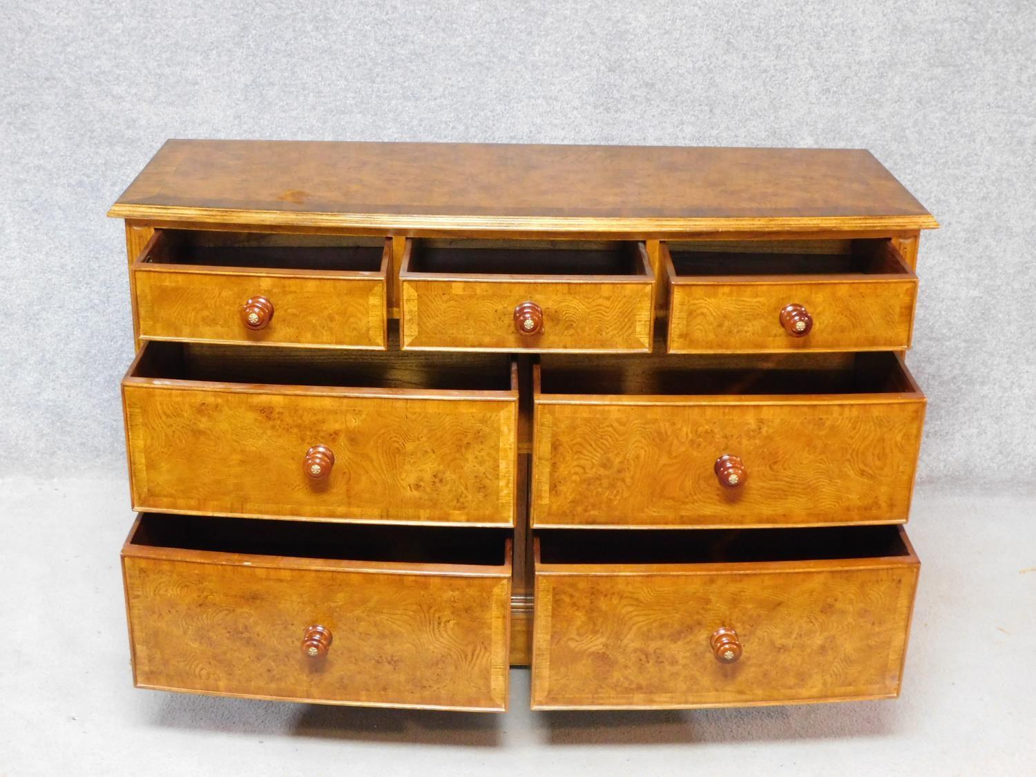 A Georgian style burr elm and crossbanded bowfronted chest of drawers on bracket feet, by Frank - Image 3 of 5