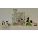 A 19th century Staffordshire flatback figure of a castle, a hand painted sheep and a horse and a