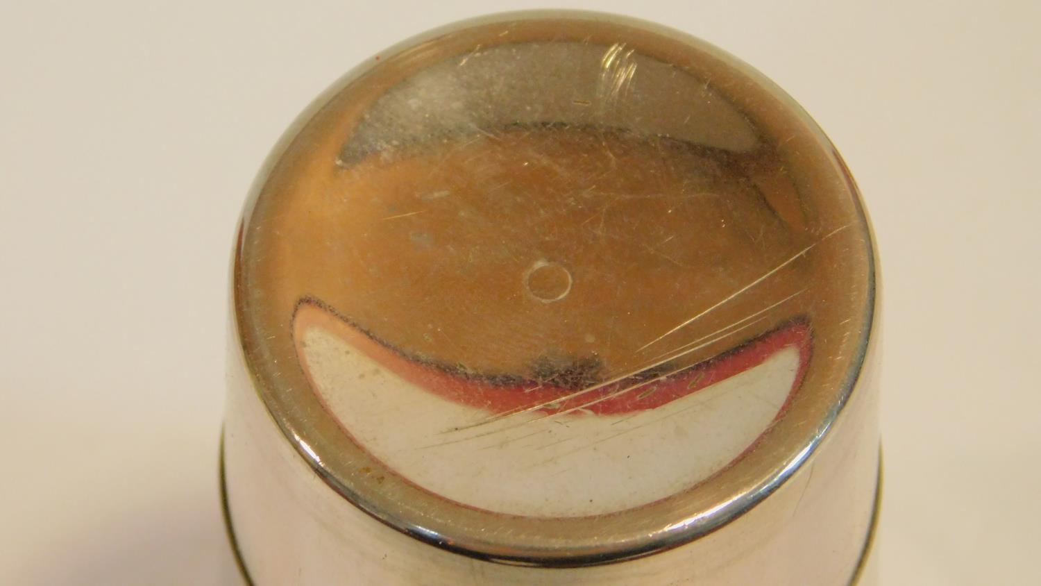An antique collapsible silver plated stirrup cup with gilded interior. In its original velvet - Image 7 of 7