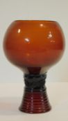 A 19th century large brown German blown glass rummer, the stem moulded with raspberry prunts and