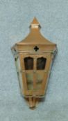 An Art and Crafts style copper wall mounted lantern. H.55cm