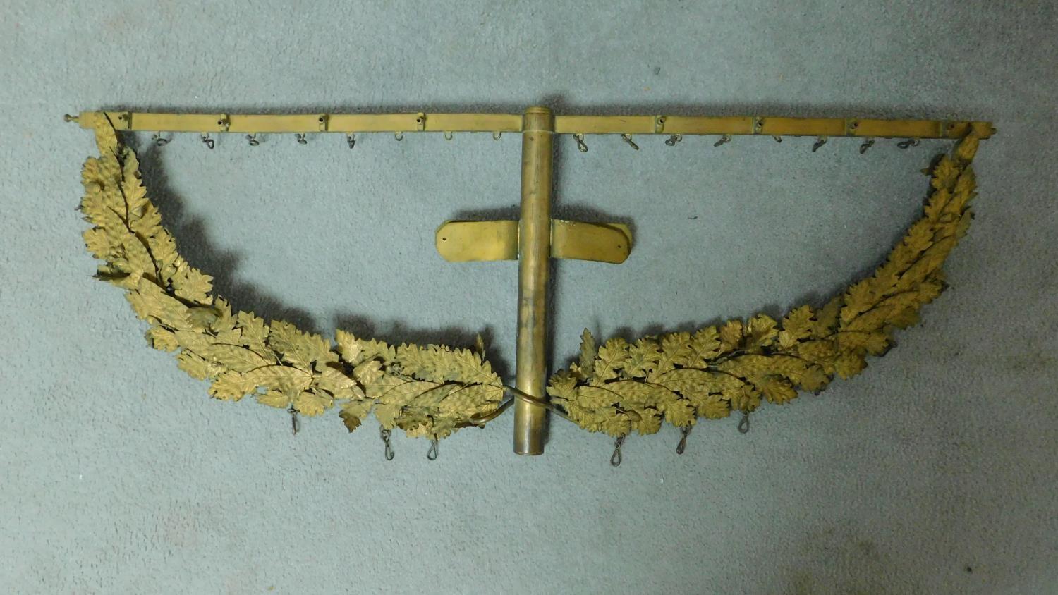 An antique gilded brass bracket with individual oak leaf decoration and hanging clip hooks. H.36 W. - Image 3 of 3