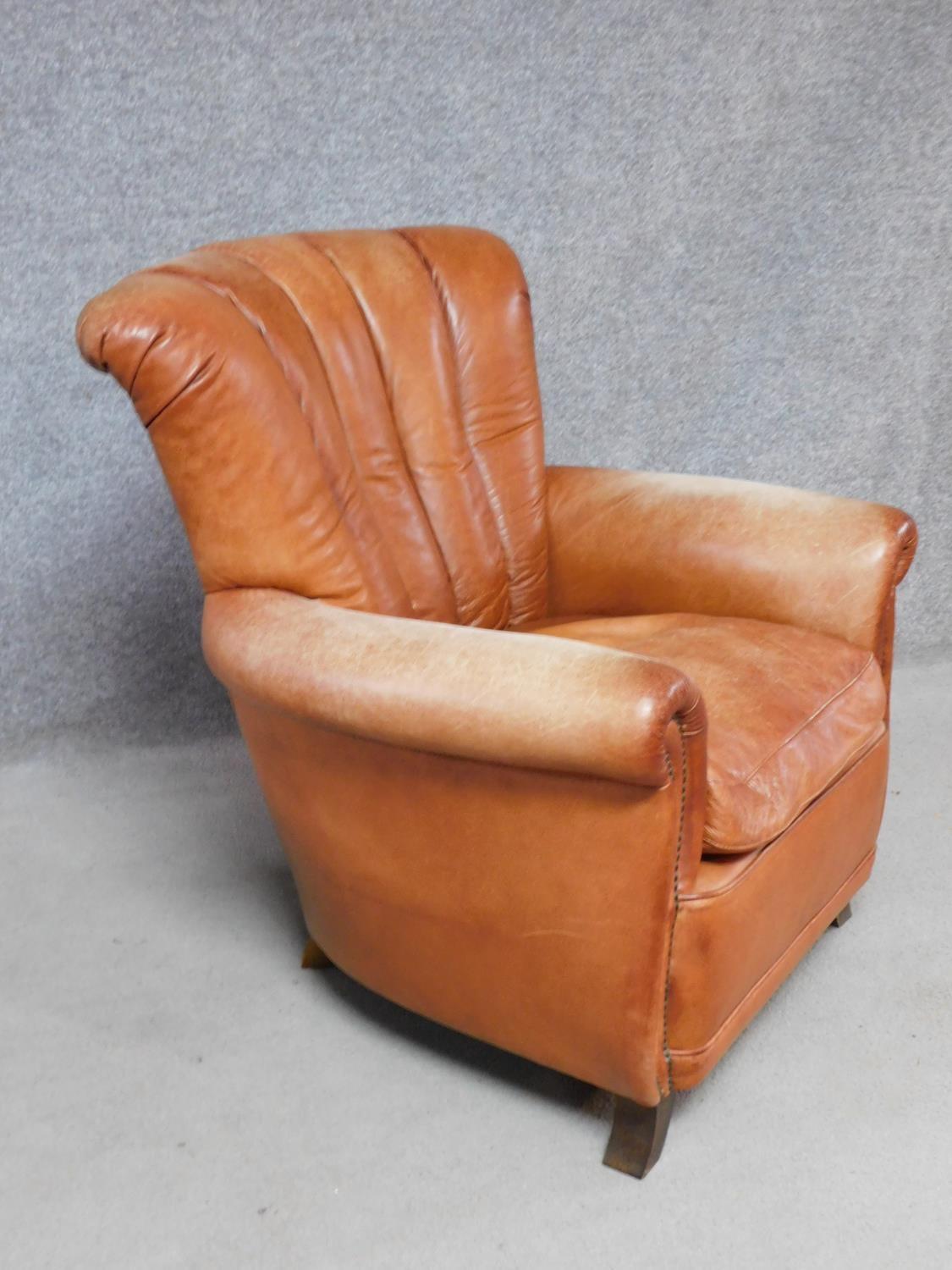 A contemporary Art Deco style armchair in tan leather with roll arms and a scallop shaped back H. - Image 2 of 2
