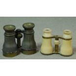 Two pairs of antique opera glasses, one with brass fittings and the other ivory. 10x12cm