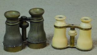 Two pairs of antique opera glasses, one with brass fittings and the other ivory. 10x12cm