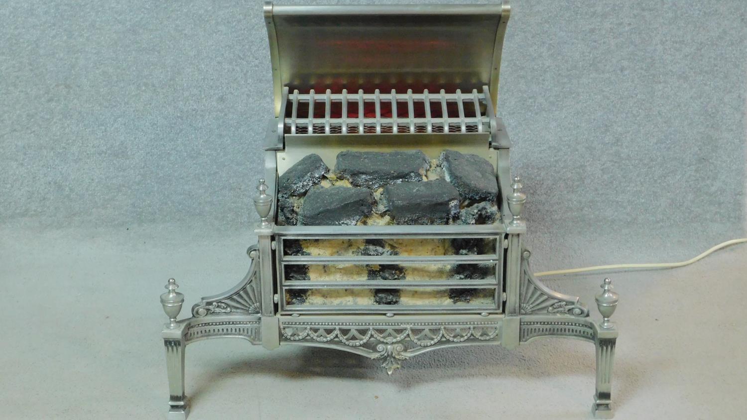 A Belling electric fire in the style of a Regency fire basket with andirons. H.71 W.80 D.45cm