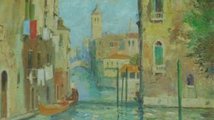 A framed oil on canvas, Venetian canal, by British artist Marcus Ford. 69x59cm
