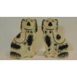 A large pair of late 19th century Staffordshire mantel dogs. H.30cm