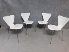 A set of four Fritz Hansen Series 7 style moulded stacking chairs on chrome supports. H.78cm