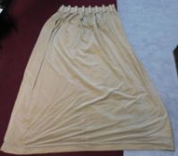 A pair of heavy beige velvet lined curtains with rope swag detailing to the top. H.253 W.130 (top)