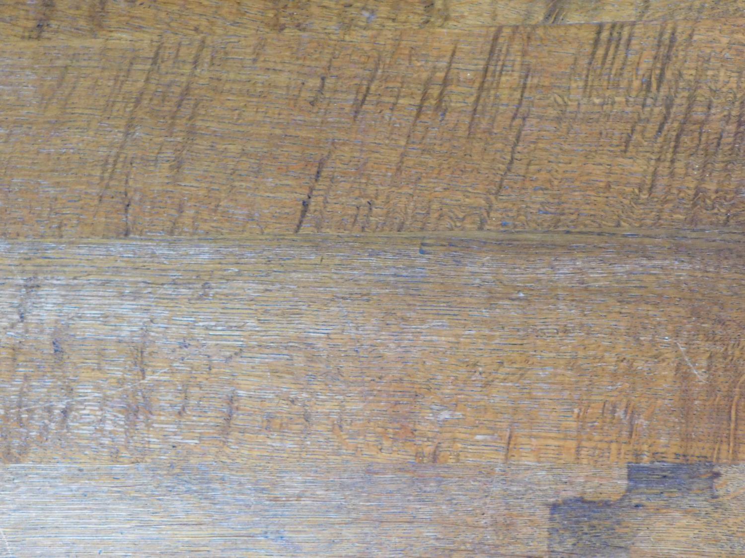 An oak refectory style dining table on stretchered chamfered square section supports on a platform - Image 4 of 4