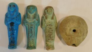 Three Egyptian style glazed faience Ushabti of typical sarcophagus form with lines of Hieroglyphs