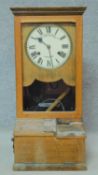 A late 19th century oak clocking in clock by Blick Time Recorders Ltd. H.45 W.40 D.33cm