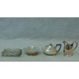 A silver plated teapot along with a silver plated milk jug, small comport and a pierced checker