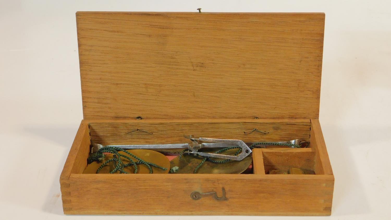 A 19th century box fitted with weighing scales, a box fitted with vintage cut throat razors and - Image 3 of 11