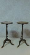 A pair of Georgian style mahogany lamp tables on tripod cabriole supports. H.57cm
