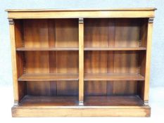 A Victorian style burr walnut and satinwood strung open bookcase, the central shelved open section