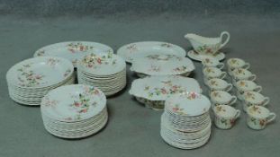 An extensive vintage Copeland Spode part dinner service with hand coloured floral design. Includes