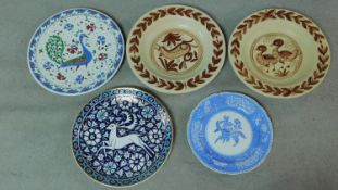 A collection of Spanish and Greek hand painted ceramic chargers and a Spode plate. One by Lindos