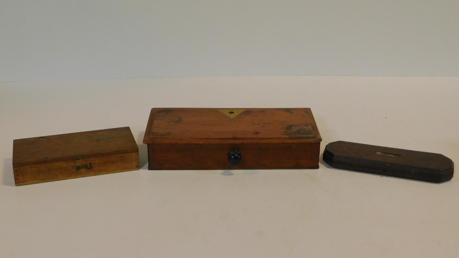 A 19th century box fitted with weighing scales, a box fitted with vintage cut throat razors and