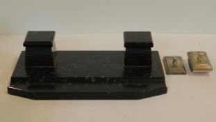 An Art Deco marble desk stand with twin inkwells with ceramic liners. to include a pair of silver