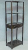 A Chinese teak four tier whatnot fitted with central drawer. H.179 W.63 D.39cm