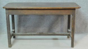 A 19th century mahogany console table on square section stretchered supports. H.73 W.133 D.58cm