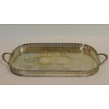 A large machine engraved two handle silver plate tray with pierced linear gallery with laurel swag