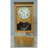 A late 19th century oak clocking in clock by Blick Time Recorders Ltd. H.45 W.40 D.33cm