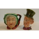 Two Beswick character mugs, a lady and a top hatted gentleman. H.23cm