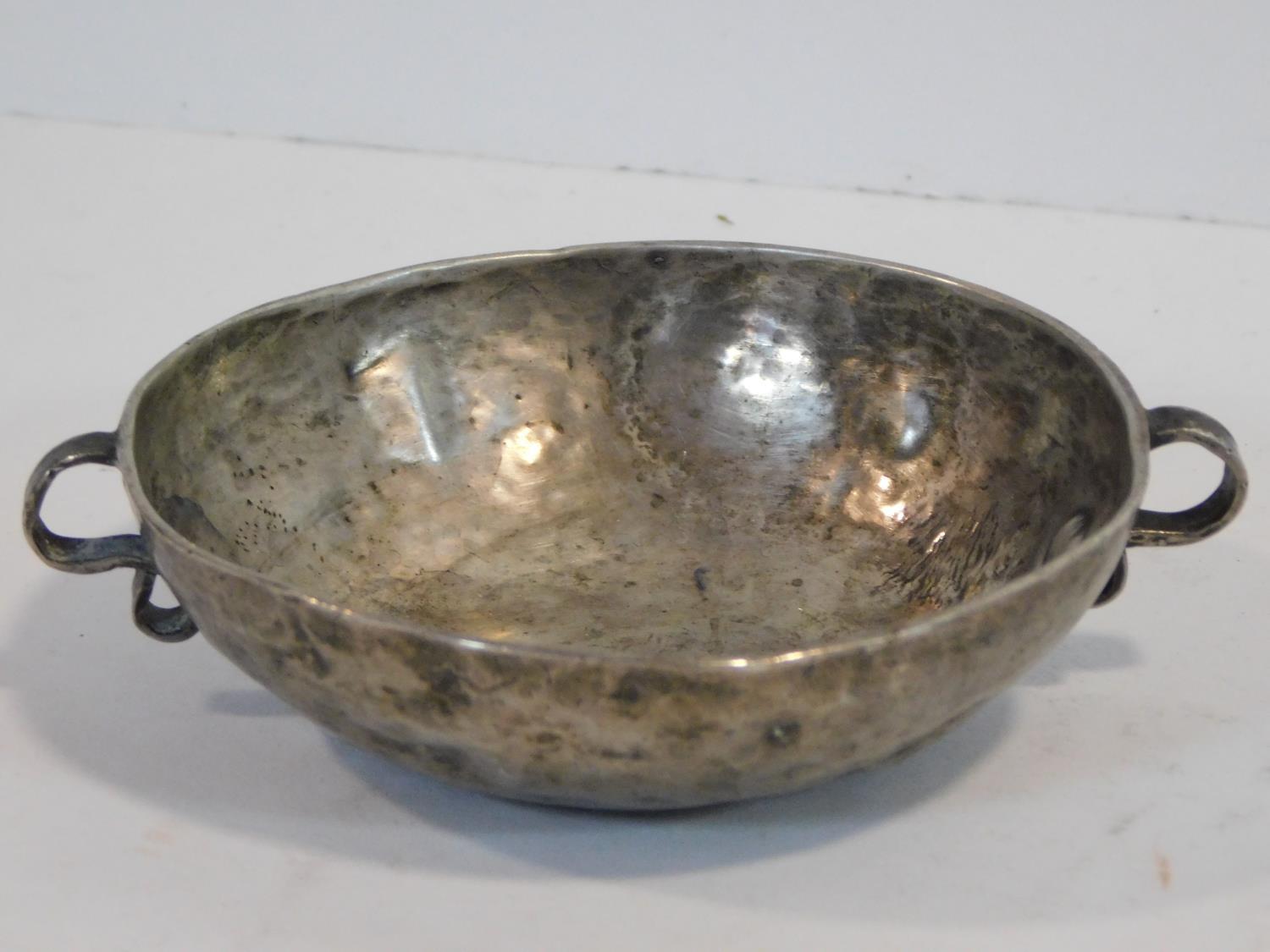 A white metal Arts and Crafts hammered design bowl/porringer. - Image 2 of 7