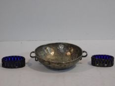 A white metal Arts and Crafts hammered design bowl/porringer.
