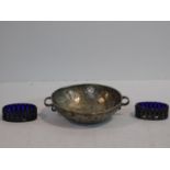 A white metal Arts and Crafts hammered design bowl/porringer.