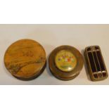 Three antique boxes. Including a treen box with central reverse painted floral design glass plaque