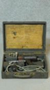 A cased vintage bakelite Bosch grinder with various head fittings. H.80 W.34 D.26cm