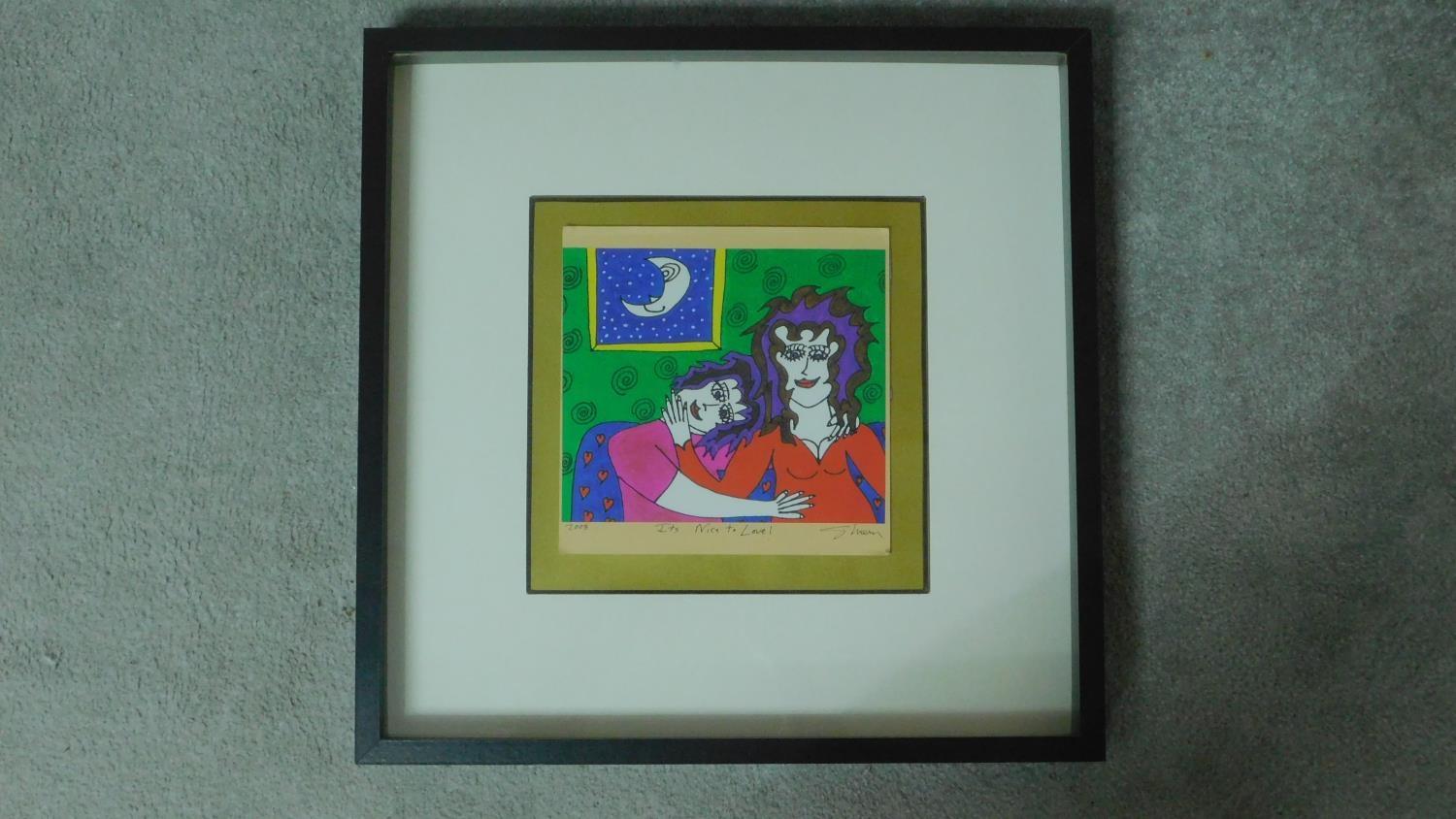 A framed and glazed signed print, titled 'Its Nice to Love', depicting an abstract couple on a sofa.