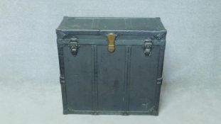 A late 19th century metal bound travelling trunk with fitted lift out compartments. H.81 W.86 D.38cm
