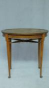 A late 19th century oak centre table on stretchered cabriole supports. H.74 W.75 D.53cm