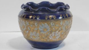 A Royal Doulton stoneware jardiniere, Slaters Patent, in deep blue glaze with textured ground of