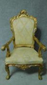 a large Louis XV style carved gilt wood throne chair in lemon lattice design upholstery. H.124cm