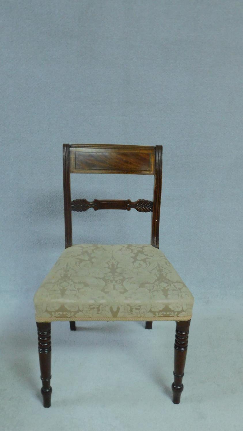 A set of five late Georgian mahogany and satinwood inlaid dining chairs in damask stuffover seats on - Image 3 of 5