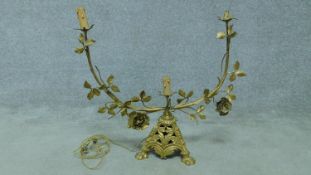 A 19th century brass three branch candelabra with leaf and foliate decoration. 60x56cm